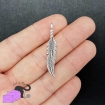 5 charms with feather silver tone