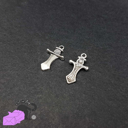 10 charms with sword, dagger, athame