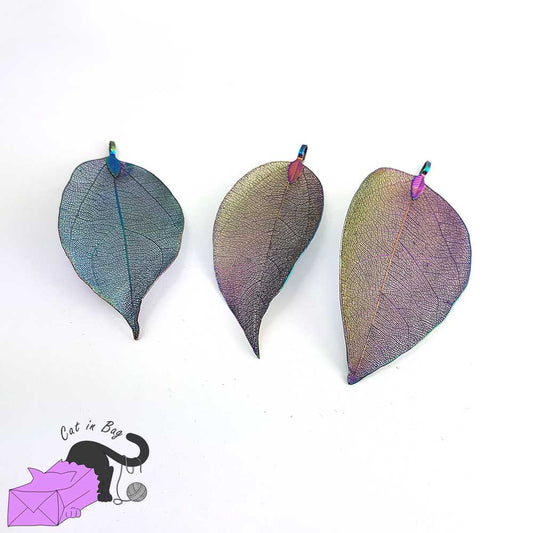 Pendants with real leaves electroplated with brass, metallic rainbow purple color