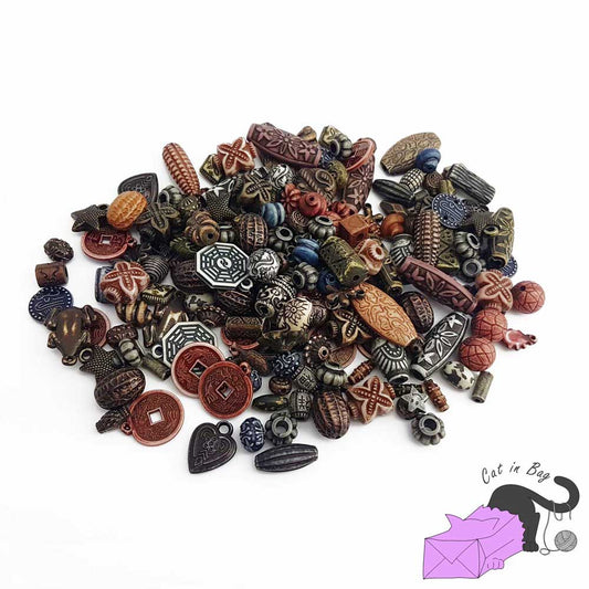 Mix of 50 gr antique ethnic effect acrylic beads in the colours of the Earth