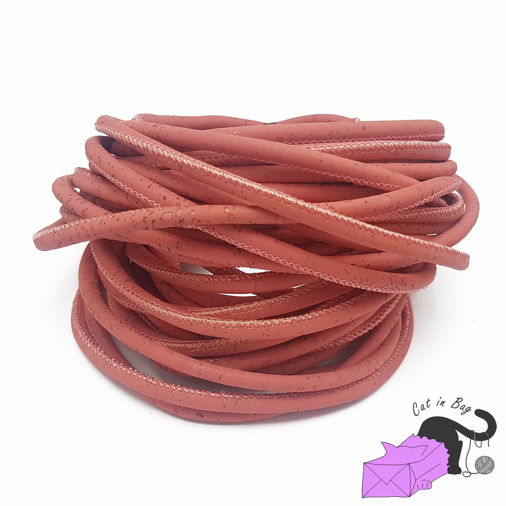 1 m of cork cord, salmon pink, 5 mm.