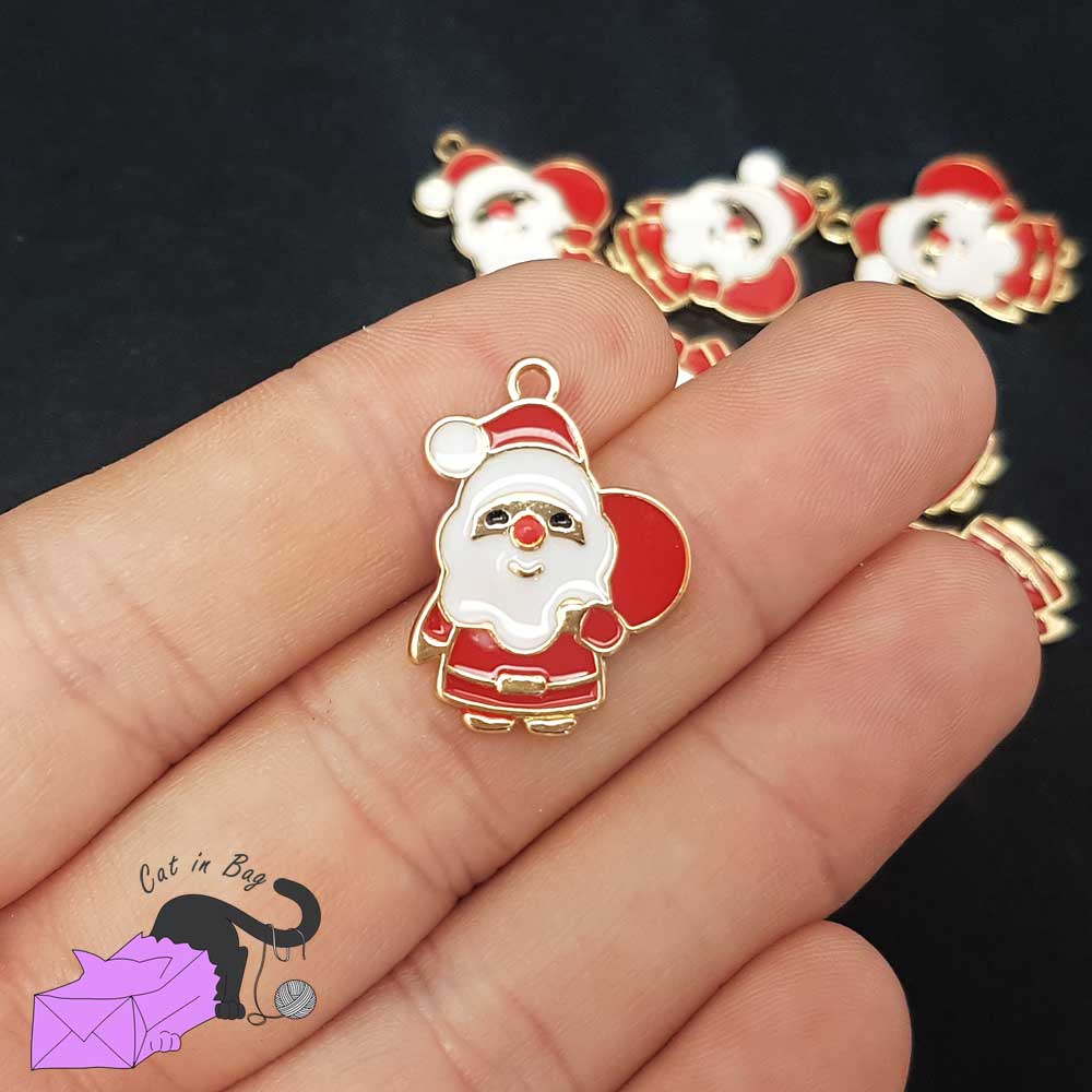 2 enamel charms with Santa Claus