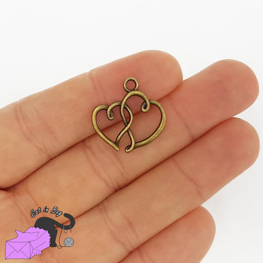 10 charms with two hearts, antique bronze tone