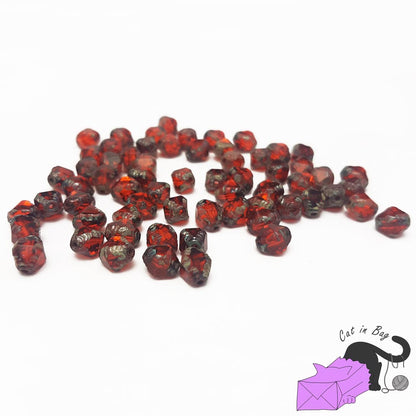 10 Czech glass beads, irregular bicone, red 8x6 mm