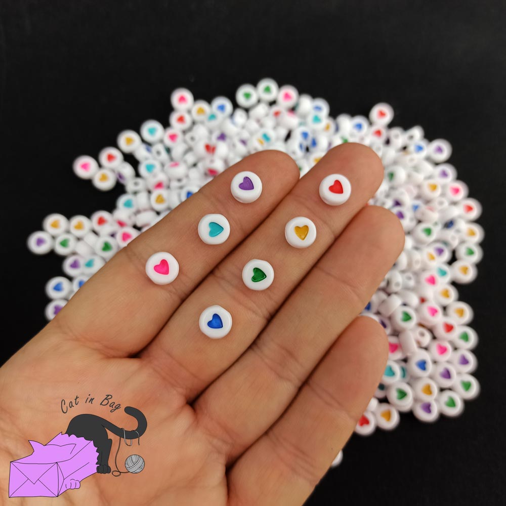 100 flat round beads with mixed colorful heart