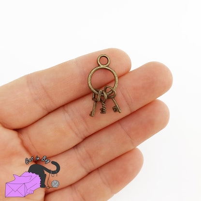 4 charms with little keys