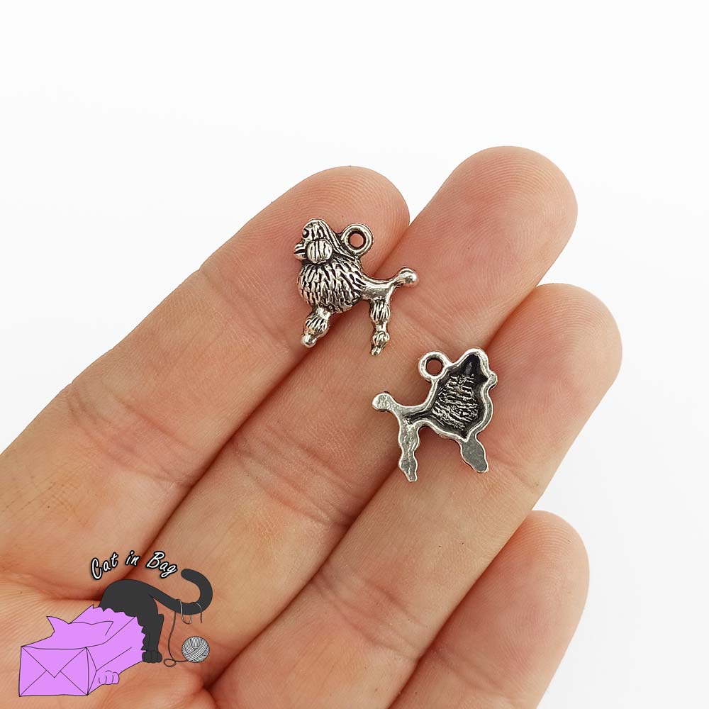 5 charms with dog poodle