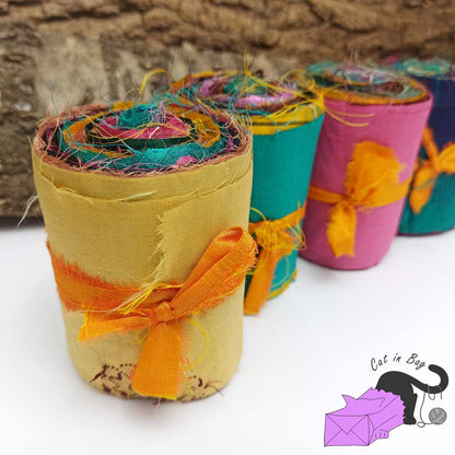 Roll of ribbons of sari silk fabric