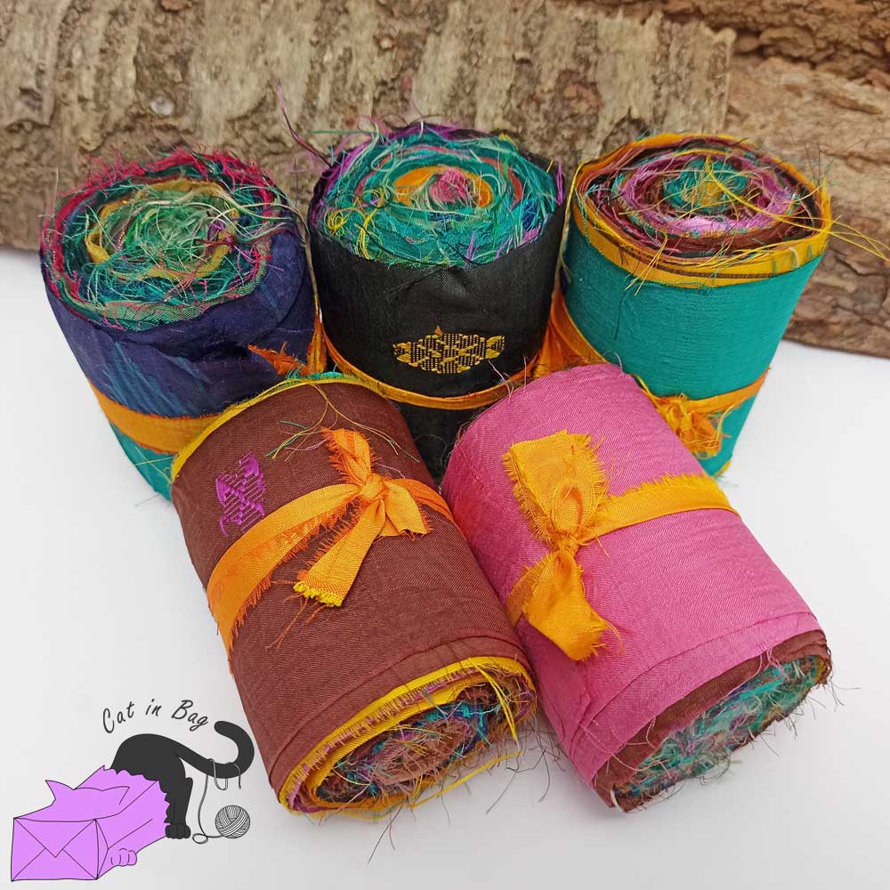 Roll of ribbons of sari silk fabric