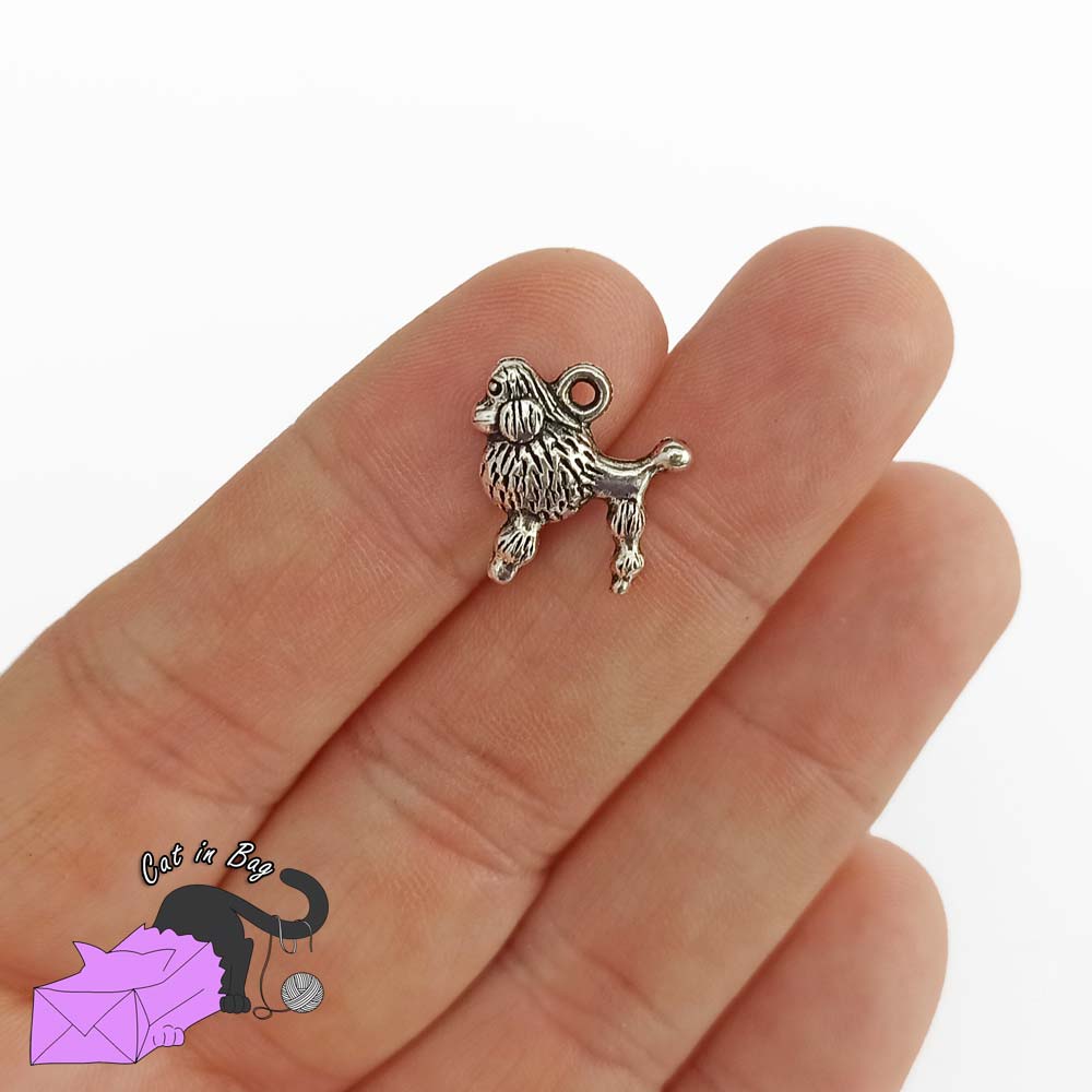 5 charms with dog poodle